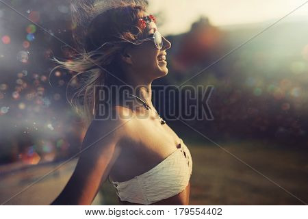 Beautiful hipster woman enjoying summer vaction and freedom