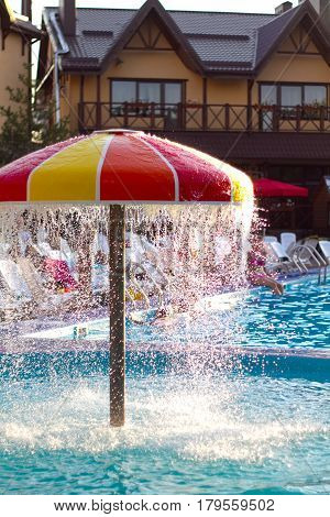 the summer pool in hot sunny day. a concept of summer holiday in aquapark. concept of recreation.