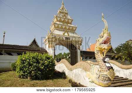 Gate Entrance With Naga Staircase For People Walking Go To Praying And Visit Chedi At Wat Phra That