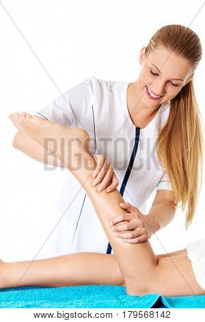 Woman having massage of body in the spa salon. Beauty treatment concept.