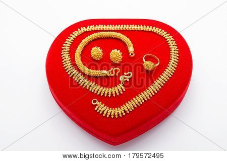 Precious Golden Jewelry Collection on Red Box