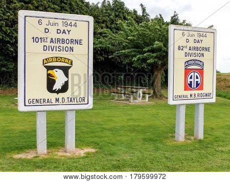 At the entrance of Sainte Mere Eglise town in Normandy two panels honor the memory of American Army airborne divisions that landed during the D-Day.