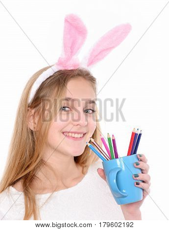 Happy Girl In Bunny Ears With Colorful Pencil In Cup