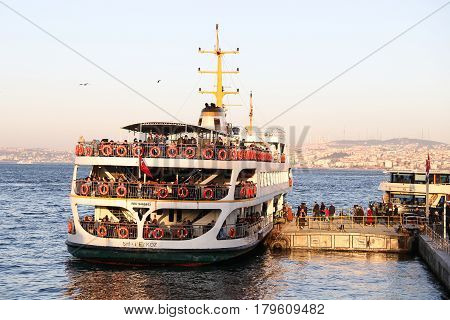 ISTANBUL TURKEY - MARCH 01 2017: Sehir Hatlari ferry in Eminonu Port. Sehir Hatlari was established in 1844 and now carry 150000 passengers a day.