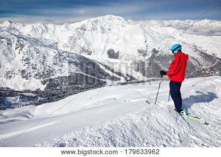 Man Enjoying The Stunning View Before Freeride Skiing In Famous Ski Resort In Alps