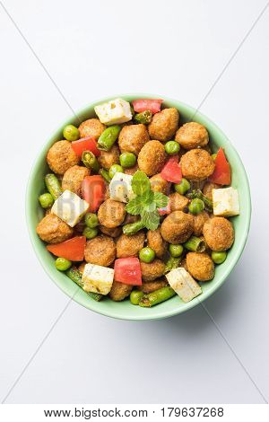 Soya chunks 65 or soya chunk fry is a healthy snack, easy to cook, protein rich, vegetarian dish ideal for starters. popular indian food. selective focus