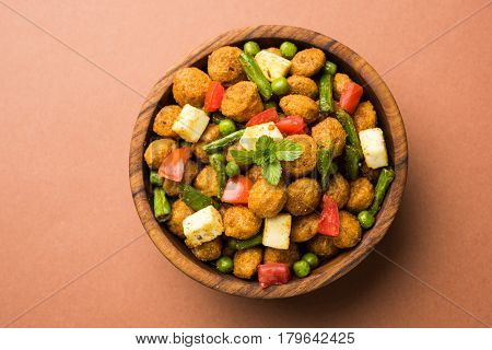 Soya chunks 65 or soya chunk fry is a healthy snack, easy to cook, protein rich, vegetarian dish ideal for starters. popular indian food. selective focus