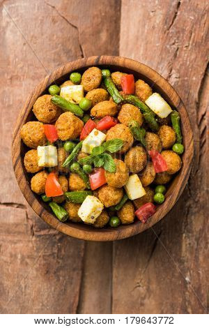 Soya chunks 65 or soya chunk fry is a healthy snack, easy to cook, protein rich, vegetarian dish ideal for starters. popular indian food. selective focus