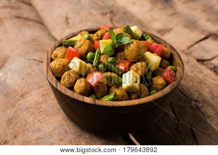 Soya chunks 65 or soya chunk fry is a healthy snack, easy to cook, protein rich, vegetarian dish ideal for starters. popular indian food. selective focus