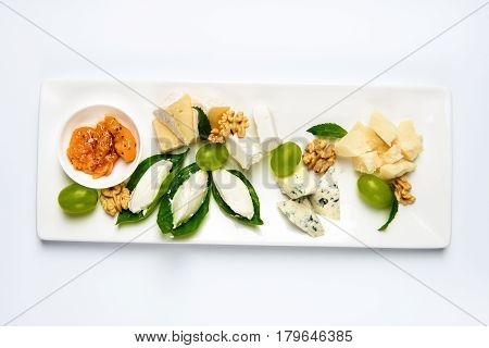 Various cheese type dish served luxery. Top view, white background, isolated.