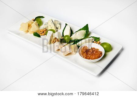 Various cheese type dish served luxery. Close-up, white background, isolated.