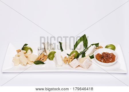 Various cheese type dish served luxery. Close-up, white background, isolated.