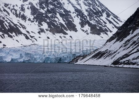 Glacier Meeting The Ocean At Svalbard In Norway