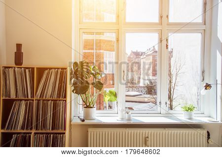Cozy room with a shining sun in the window