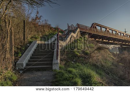Railway track and bridge in Bakov nad Jizerou area with sunrise