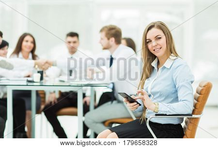 leading lawyer of the company on background, business meeting business partners. the photo has a empty space for your text.