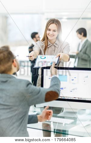 specialist of Finance and Manager of the company working with financial charts in the company's profit.the photo has a empty space for your text.