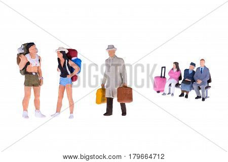 Close Up Of Miniature Businessman And Tourist People Isolate On White Background. Elegant Design Wit