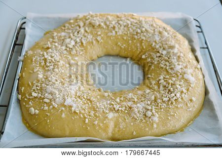 Close Up Of making of sweet bread ringed dessert On oven plate. Called roscon is typical in spanish cuisine. Horizontal composition