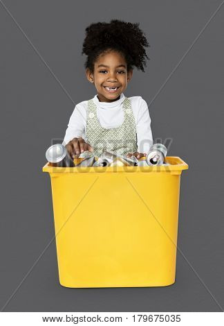 African Descent Girl holding Plastic Container