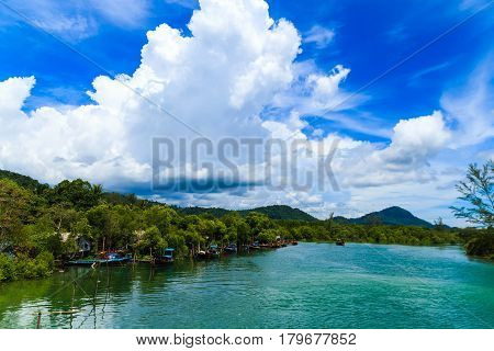 Fishing village with blue sky In Sikao Thailand.