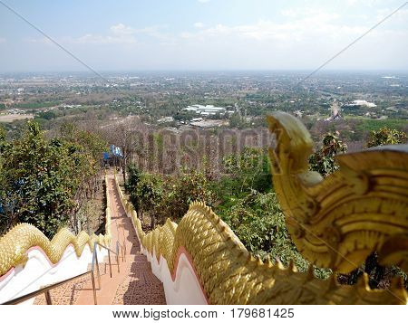 Landscape view with staircases from Wat Phra That Doi Kham (Temple of the Golden Mountain) in Chiang Mai Thailand