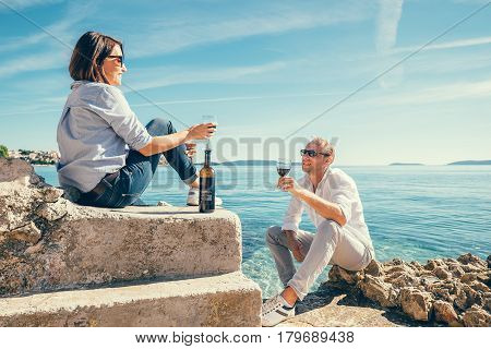 Couple in love have romantic date in blue sea lagune