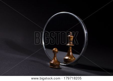 Pawn Looking In The Mirror And Seeing A King.