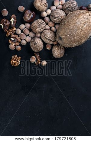 Assorted Nuts On A Black Background