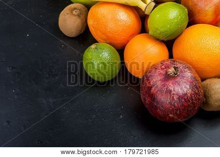 Many Various Fruits On A Black Background