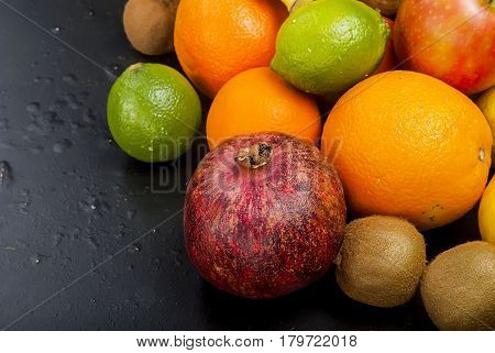 Many Various Fruits On A Black Background