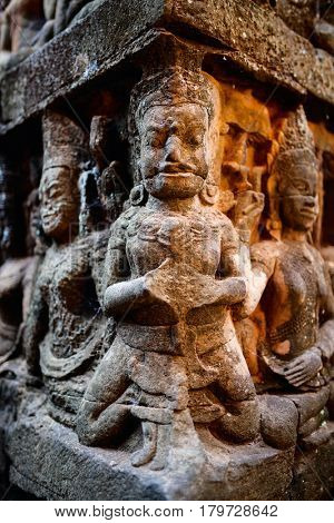Bas reliefs in Terrace of the Leper King in Angkor Archaeological area in Cambodia