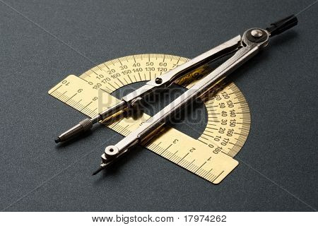 Pair of compasses and protractor