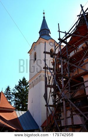 Reconstruction Of The Old Fortified Medieval Saxon Church In Dirjiu, Transylvania, Romania. Scaffold