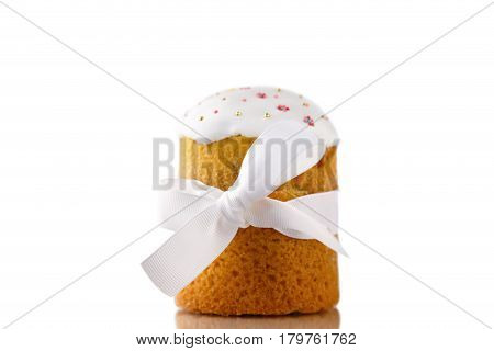 Easter cake with white ribbon isolated on white background