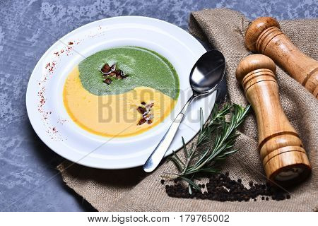 Spinach And Pumpkin Cream Soup With Rosemary And Pepper