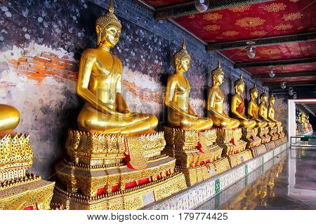 The Row of Golden Buddha in Thailand Bangkok Thailand