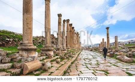 Tourist On Cardo Maximus Road In Winter In Rain