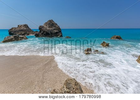 Amazing landscape of blue waters of Megali Petra Beach, Lefkada, Ionian Islands, Greece