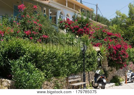 AGIOS NIKITAS, LEFKADA, GREECE JULY 16, 2014: Traditional houses in village of Agios Nikitas, Lefkada, Ionian Islands, Greece