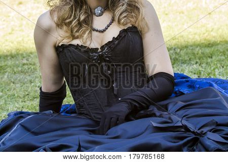 CAGLIARI, ITALY - May 29, 2016: Sunday at La Grande Jatte VIII Ed. At the Public Gardens - detail of the skirt of a costume Victorian - Sardinia