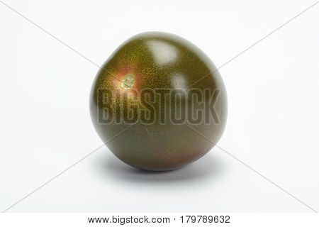 Tomate kumato on white background, one item