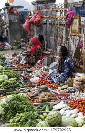 Unidentified Group Of Women Selling Tropical Fruit In The Street