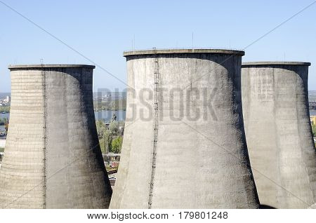 Industrial chimney against blue sky aerial view