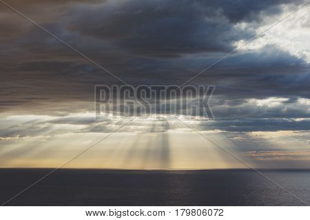 Clouds blue sky and sunlight sunset on horizon ocean . Сloudscape on background seascape dramatic atmosphere rays sunrise. Relax view waves sea mockup nature evening concept.