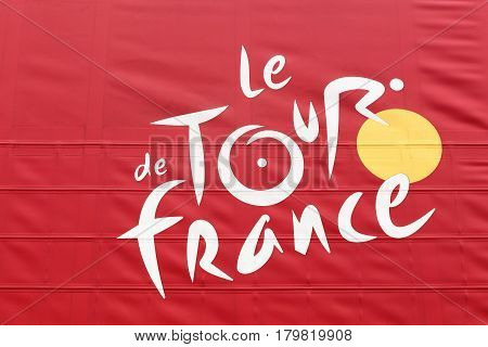 Brouilly, France - March 8, 2017: Tour de France logo on a truck. Tour de France is an annual multiple stage bicycle race primarily held in France