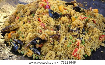 Spanish Paella With Yellow Rice And Mussels And Seafood