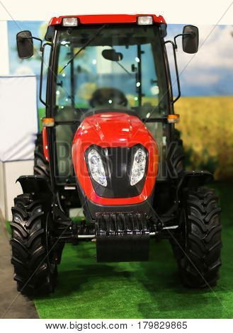 Modern tractor on agricultural exhibition