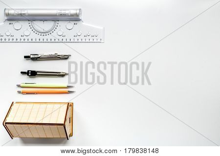 Construction office with architect working tools on white table background top view mockup