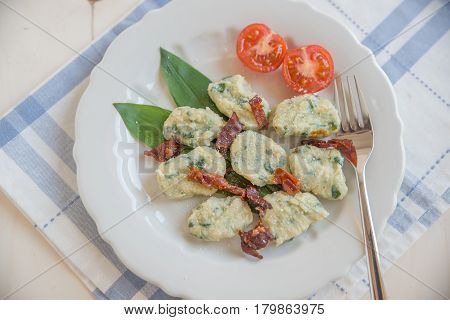 home made wild garlic gnocchi with bacon and cheese